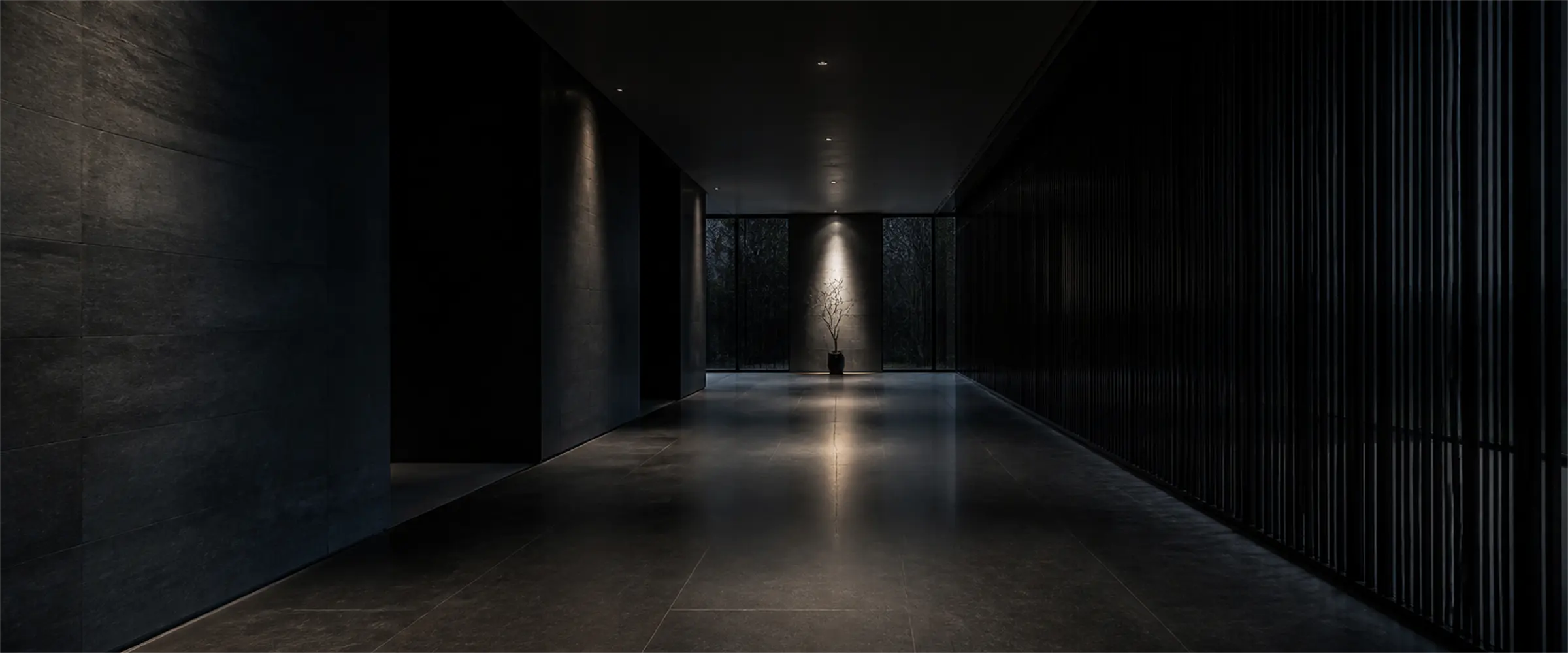 A quiet unlit corridor before dawn.